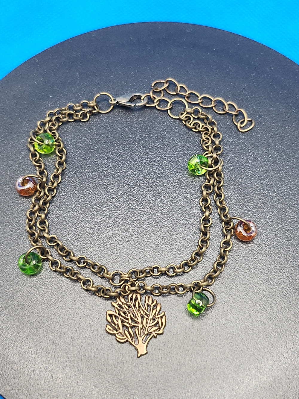 Bronze Tree Charm Necklace with Green and Amber Beads